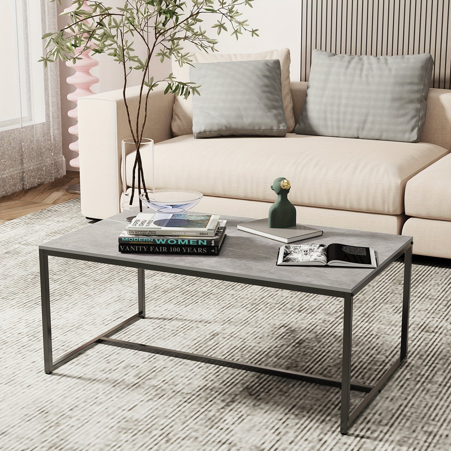 Mesa de centro para sala de estar de estilo moderno - Sobre de piedra sinterizada y estructura metálica en negro