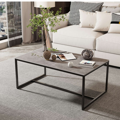 Mesa de centro para sala de estar de estilo moderno - Sobre de piedra sinterizada y estructura metálica en negro